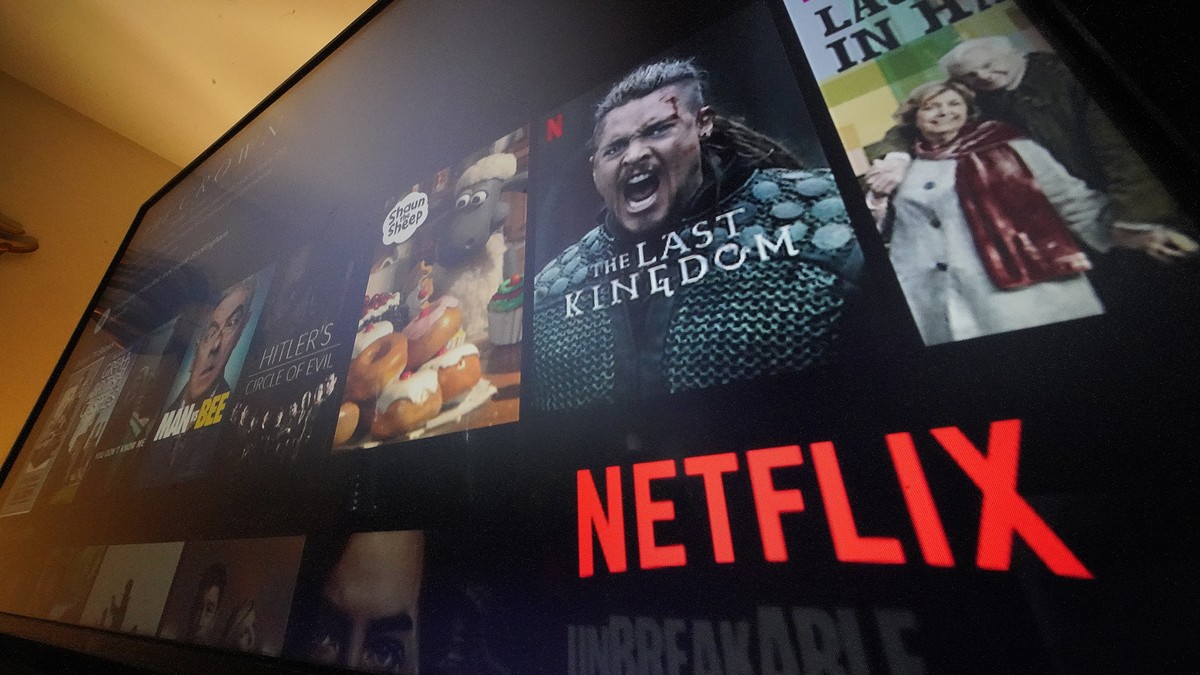 The Netflix menu is shown on a screen in Pittsburgh, on Monday, Oct. 17, 2022. Netflix posted its third quarter results a few weeks before the company launches a cheaper version of its video streaming ...