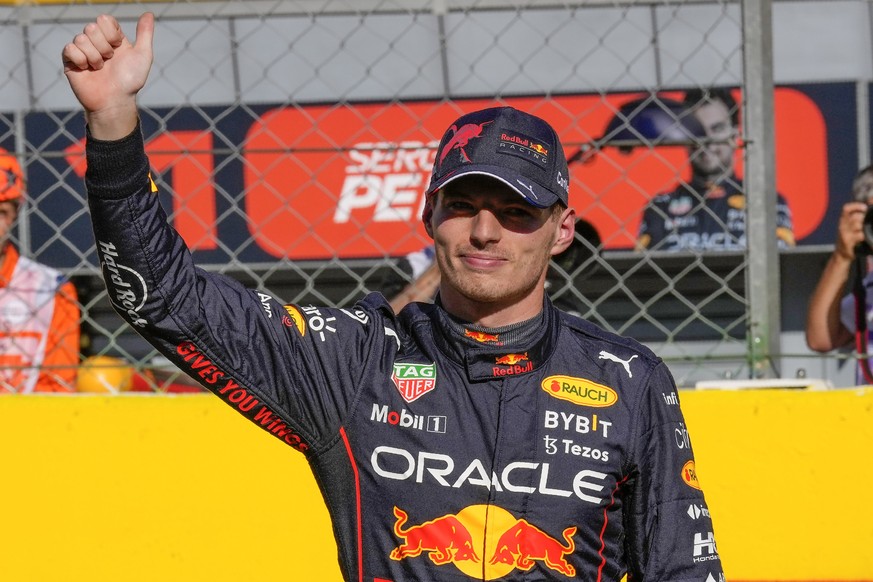 Red Bull driver Max Verstappen of the Netherlands celebrates after setting the second best time in the qualifying session at the Monza racetrack, in Monza, Italy, Saturday, Sept. 10, 2022. The Formula ...