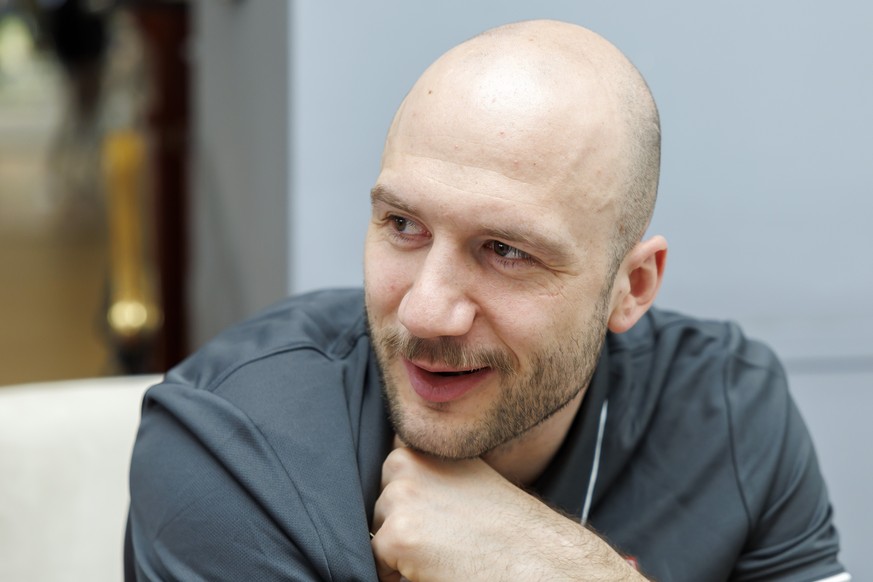 Switzerland&#039;s defender Christian Marti speaks to the journalist, during the media opportunity of the Switzerland National Ice Hockey Team at the IIHF 2023 World Championship, at the Riga Arena, i ...