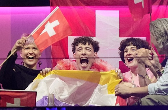 Nemo of Switzerland who performed the song The Code celebrates as the judges votes start to be announced during the Grand Final of the Eurovision Song Contest in Malmo, Sweden, Saturday, May 11, 2024. ...