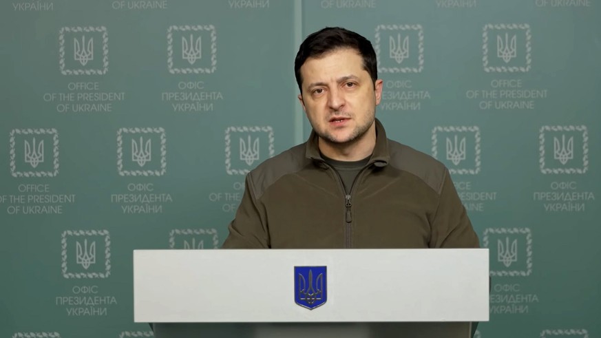 epaselect epa09786960 A still image taken from a handout video made released by the Ukrainian Presidential Press Service on 26 February 2022 shows Ukrainian President Volodymyr Zelensky speaking about ...