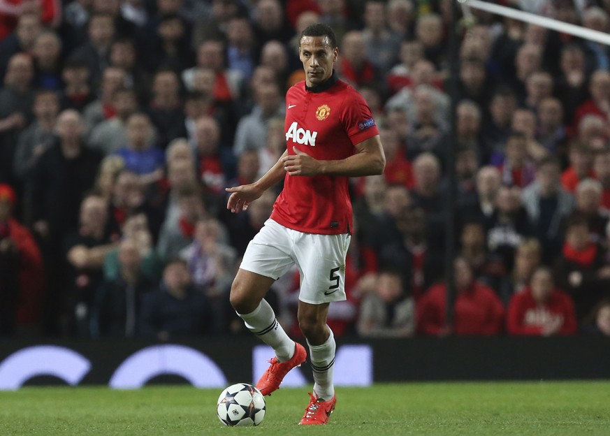 FILE - In th9is file photo dated Tuesday April 1, 2014, showing Manchester United soccer player Rio Ferdinand during the Champions League quarterfinal first leg soccer match between Manchester United  ...