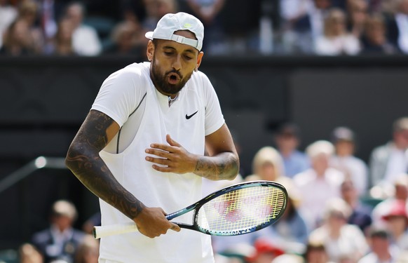 epa10051685 Nick Kyrgios of Australi gestures in the men&#039;s 4th round match against Brandon Nakashima of the US at the Wimbledon Championships, in Wimbledon, Britain, 04 July 2022. EPA/TOLGA AKMEN ...