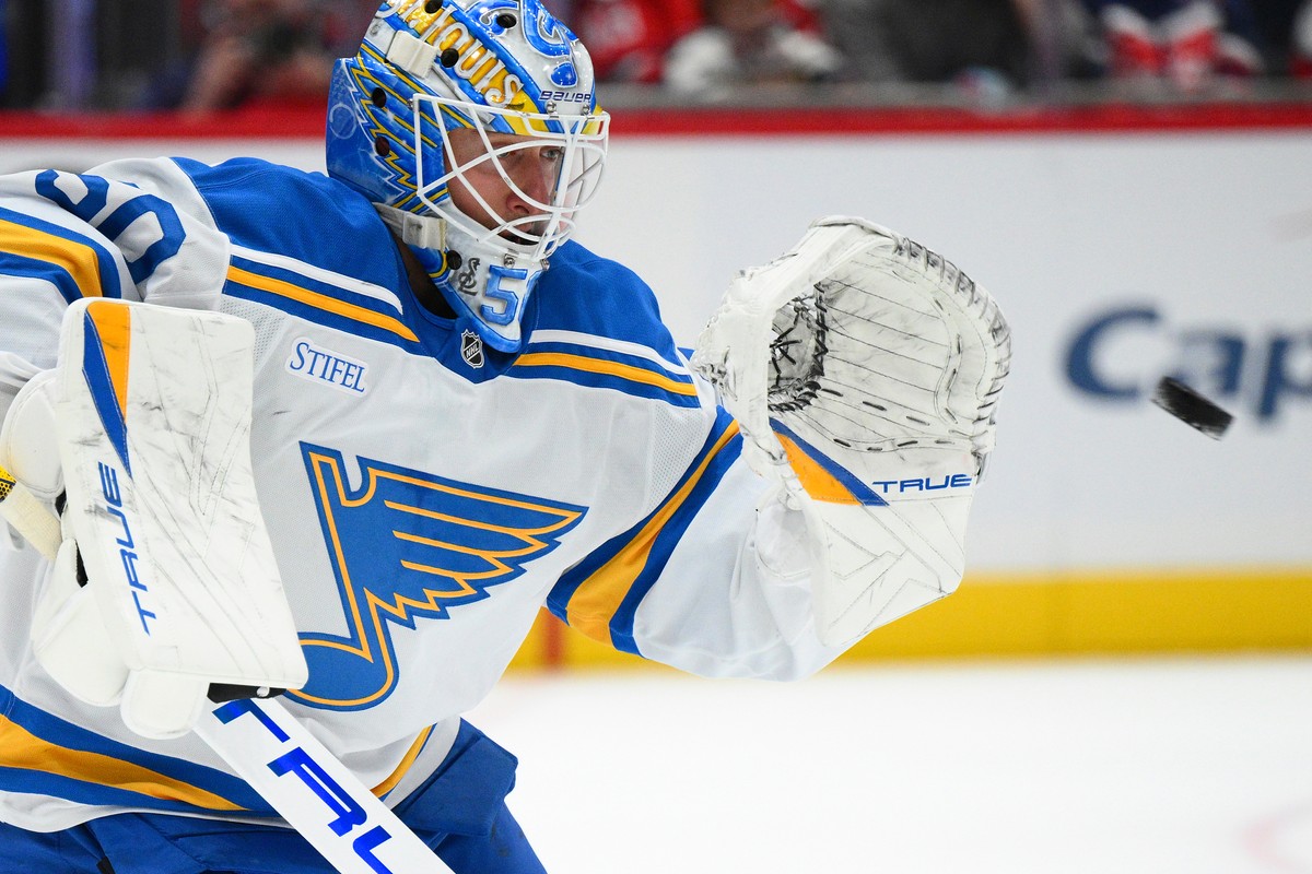 St. Louis Blues goaltender Jordan Binnington (50) stops a puck during the first period of an NHL hockey game against the Washington Capitals, Wednesday, Nov. 5, 2025, in Washington. (AP Photo/Nick Was ...