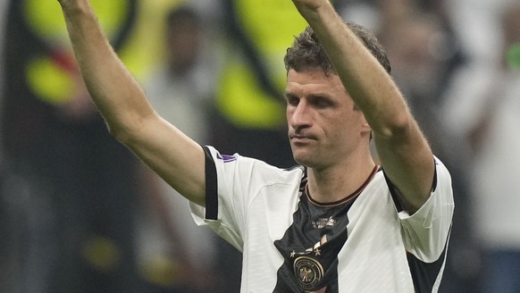 Germany's Thomas Mueller salute supporters as he leaves the pitch at the end of the World Cup group E soccer match between Costa Rica and Germany at the Al Bayt Stadium in Al Khor, Qatar, Friday, ...