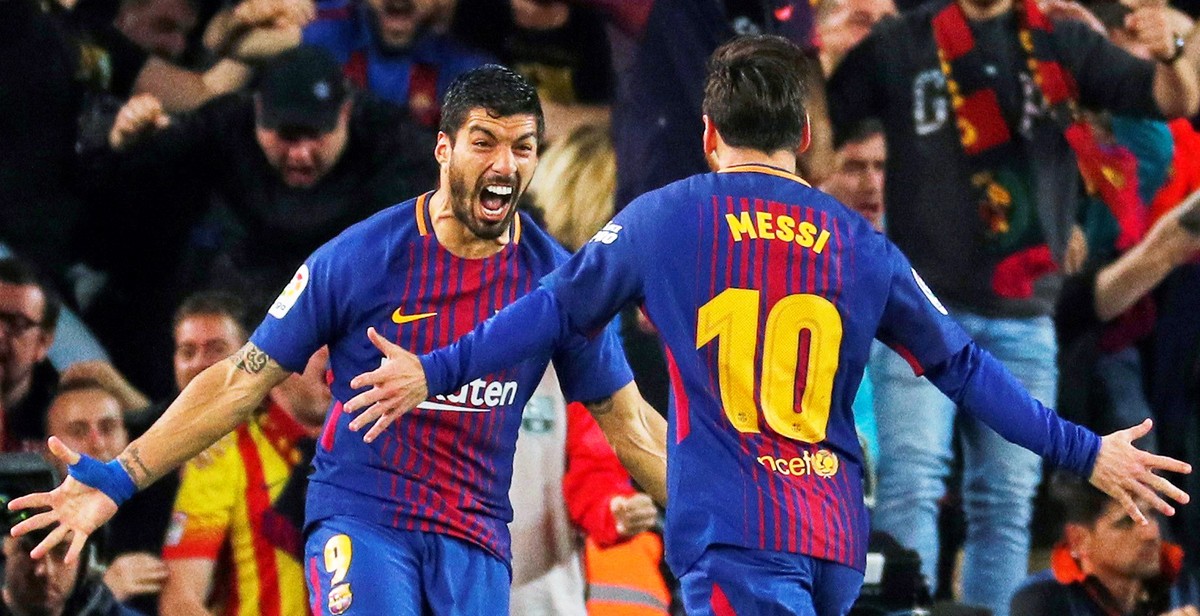 epa06715892 FC Barcelona's striker Lionel Messi (R) celebrates with his teammate Luis Suarez (L) after scoring the 2-1 lead during the Spanish Primera Division soccer match between FC Barcelona a ...