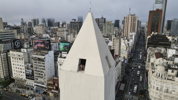 A person peers out of a lookout in the Obelisk during a city tour in Buenos Aires, Argentina, Thursday, May 8, 2025. (AP Photo/Victor R. Caivano)
Argentina Obelisk