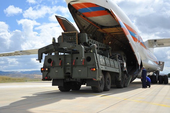 epa07712459 QUALITY REPEAT ....A handout photo made available by Turkish Defence Ministry press office shows Russian military cargo planes carrying some part of the Russian S-400 anti-aircraft missile ...