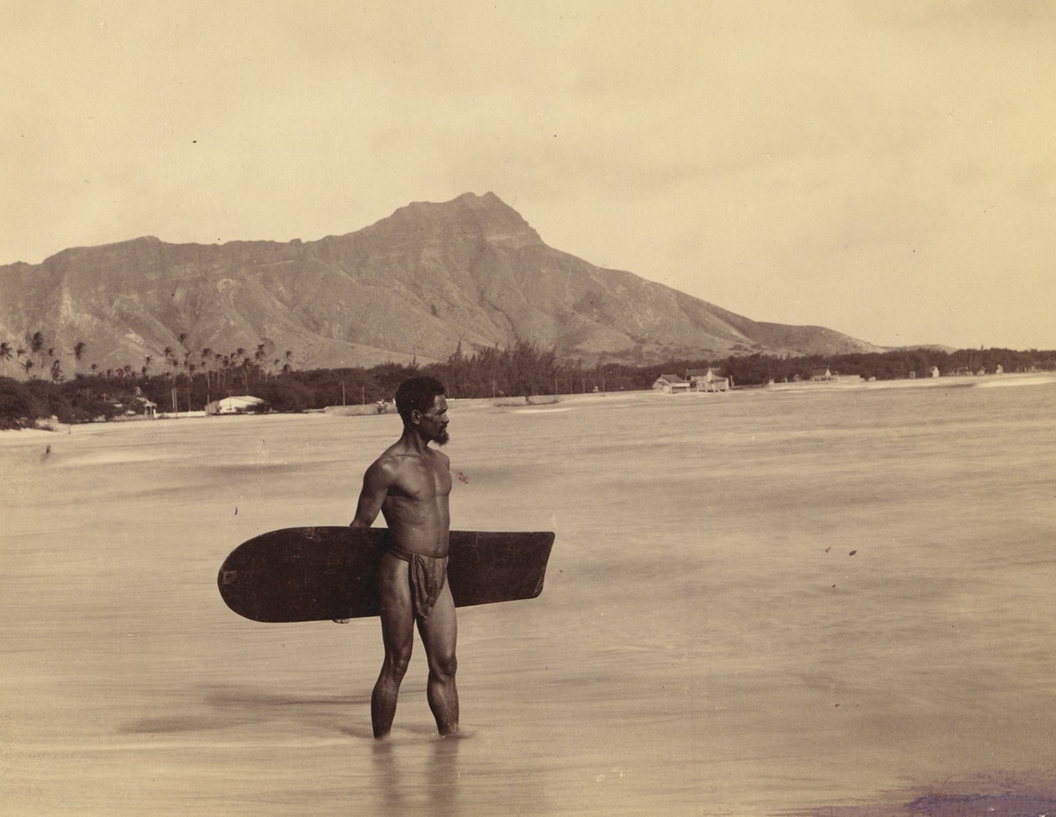 The lone Hawaiian surfer wearing the malo at Waikiki Beach carries one of the last Alaia surf board. The surfer was Charles Kauha. Frank Davey photographed Charles Kauha in 1898 in numerous poses, but ...