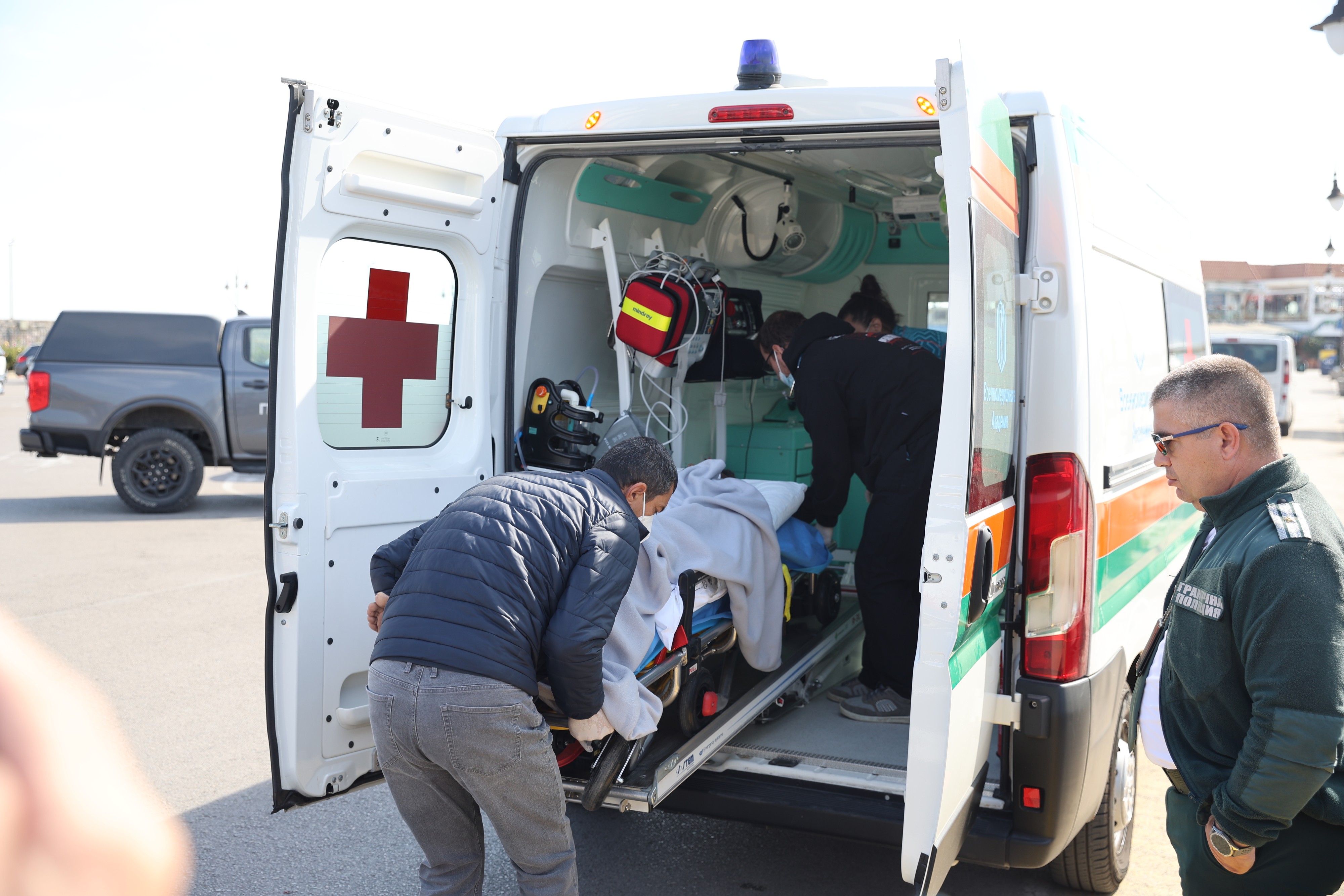 Bulgarian authorities take an injured crew member to a hospital after two commercial vessels were attacked in the NATO member's Black Sea economic zone on Tuesday, Oct. 6, 2026, Varna, in what wa ...