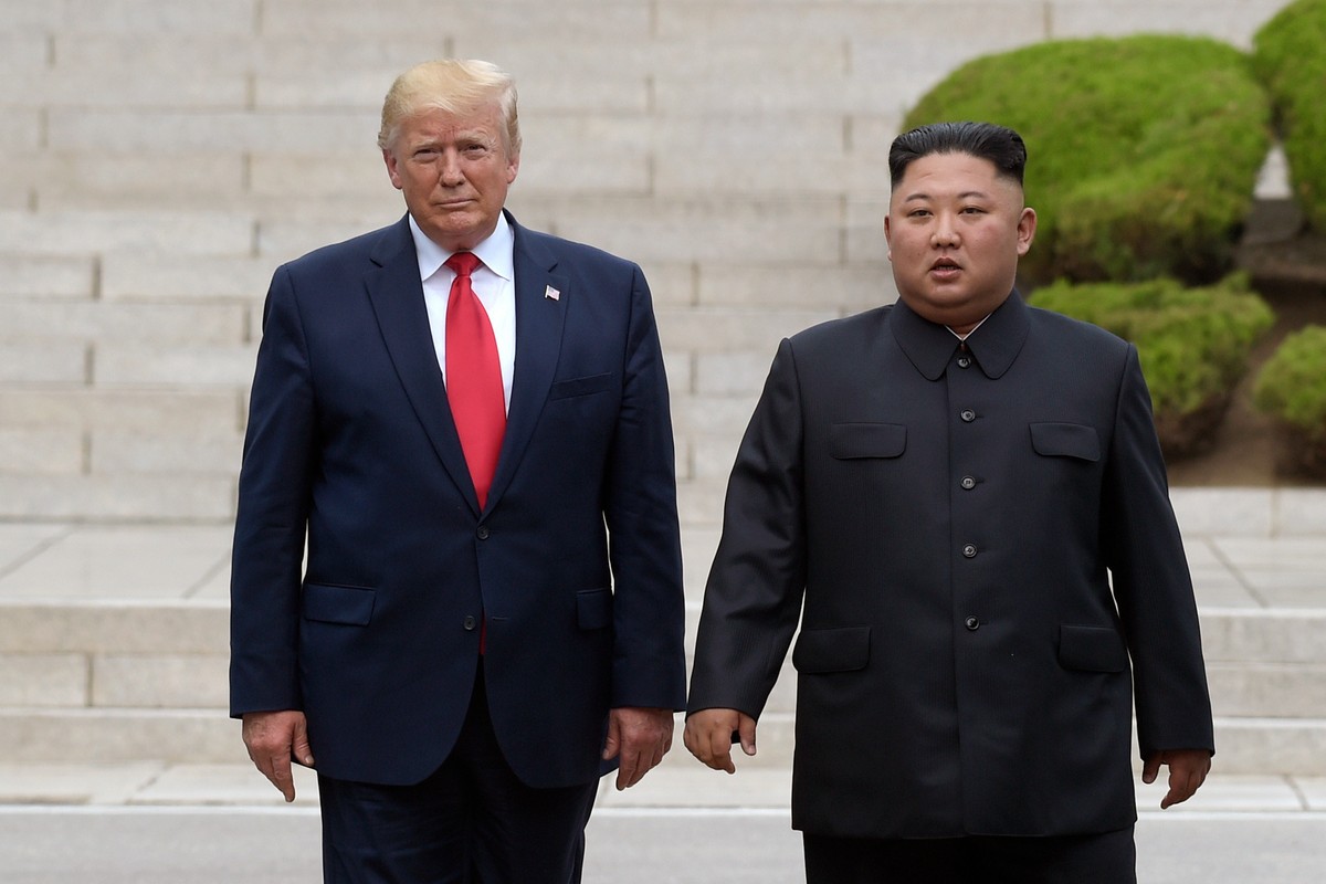 FILE - President Donald Trump, left, meets with North Korean leader Kim Jong Un at the North Korean side of the border at the village of Panmunjom in Demilitarized Zone, June 30, 2019. (AP Photo/Susan ...