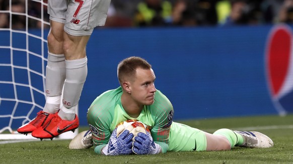 Liverpool&#039;s James Milner reacts after a save by Barcelona goalkeeper Marc-Andre ter Stegen, on the ground, during the Champions League semifinal, first leg, soccer match between FC Barcelona and  ...