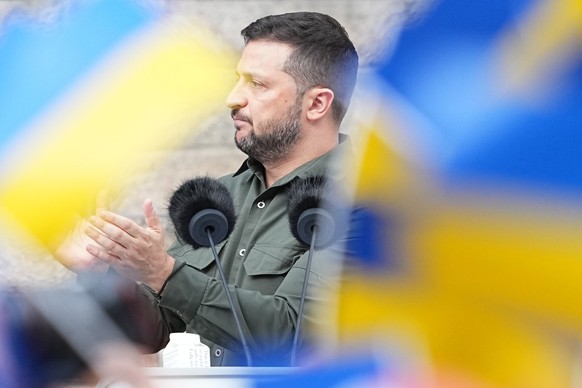 Ukrainian President Volodymyr Zelenskyy addresses the Danish people from the steps of Christiansborg palace, the seat of Danish Parliament, in Copenhagen, Denmark, Monday, Aug. 21, 2023. Thousands of  ...