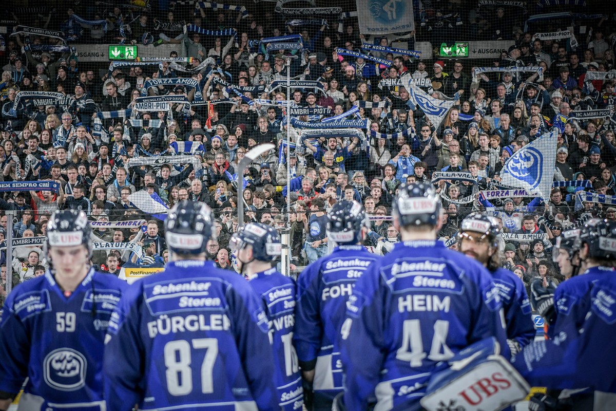 Ambri`s team and fans after the game between Switzerland's HC Ambri-Piotta and the Czech HC Republic's Dynamo Pardubice, at the 95th Spengler Cup ice hockey tournament in Davos, Switzerland, ...