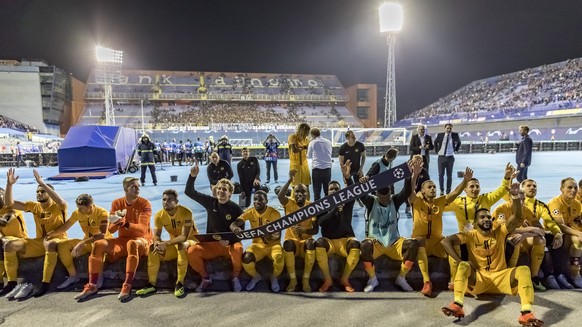 YBs players celebrate after the UEFA Champions League football 2nd leg playoff match between GNK Dinamo Zagreb from Croatia and BSC Young Boys from Switzerland, in the Stadion Maksimir, in Zagreb, Cro ...