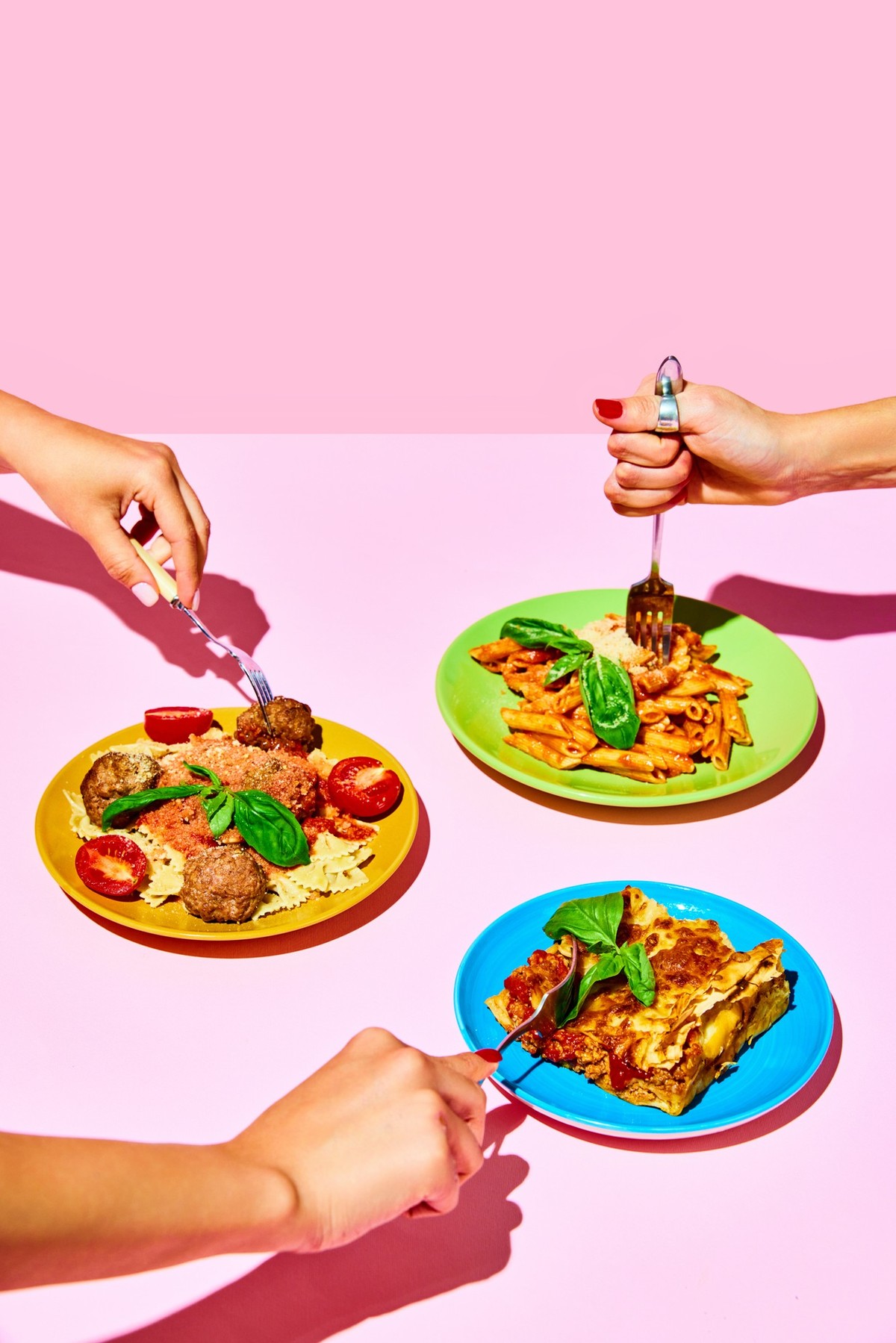People holding forks over plates with different pasta dishes, lasagna,penne with Bolognese sauce and farfalle with meatballs. Concept of Italian food, cuisine, taste, menu. Pop art. Poster, ad