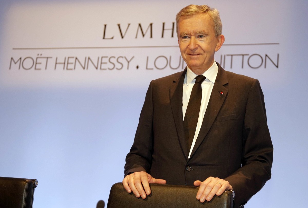 Bernard Arnault, Chairman and CEO of LVMH, Moet Hennessy Louis Vuitton, the Paris-based luxury goods empire, poses during the presentation of the 2012 year results, in Paris, Thursday, Jan. 31, 2013 . ...