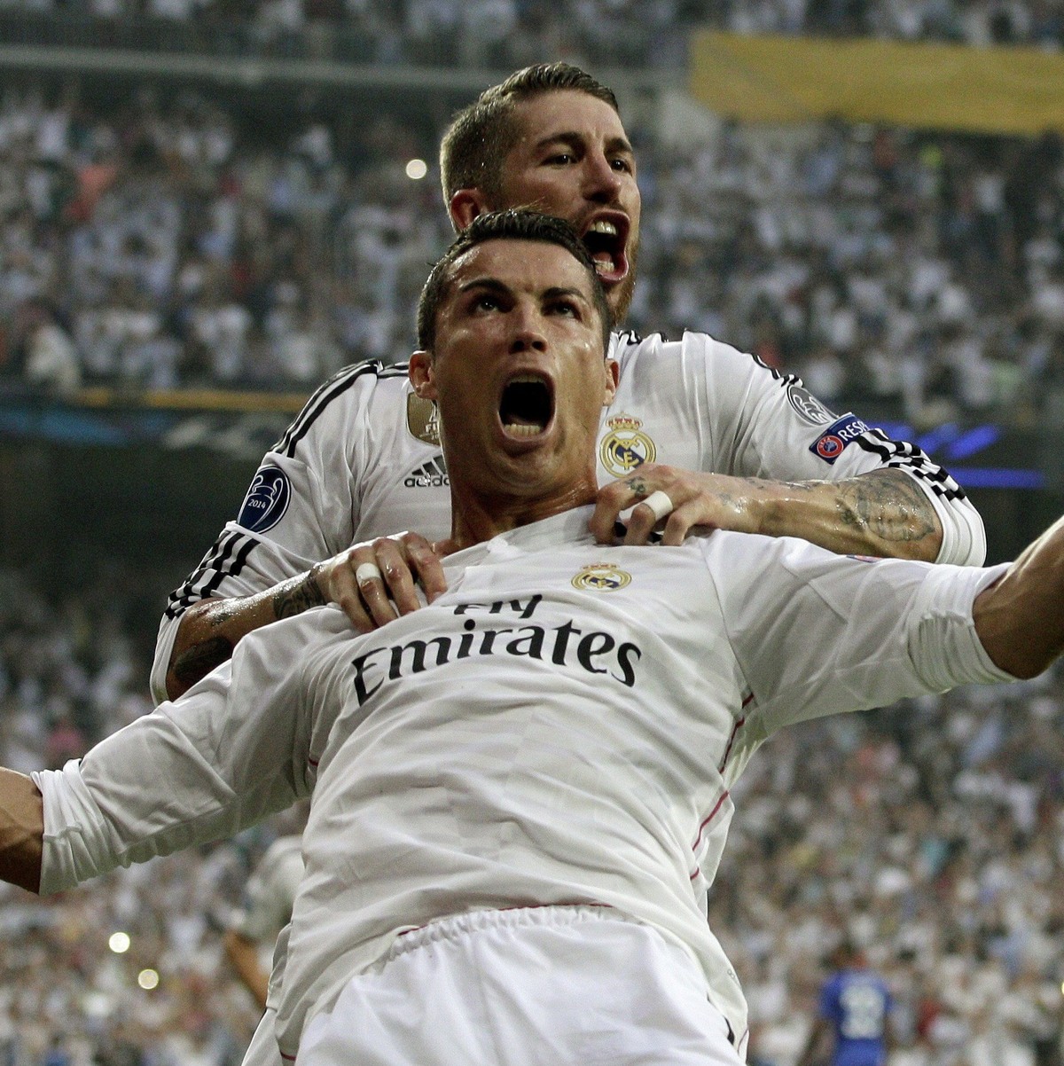 epaselect epa04747126 Real Madrid's Portuguese striker Cristiano Ronaldo (front) celebrates with Sergio Ramos (back ) after scoring the opening goal against Juventus FC during the UEFA Champions  ...