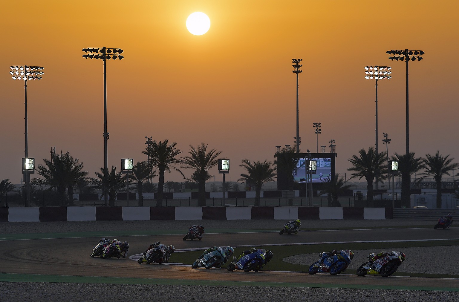 epa08276774 Moto3 riders in action during the qualifying session of the Motorcycling Grand Prix of Qatar at the Losail International Circuit in Doha, Qatar, 07 March 2020. EPA/NOUSHAD THEKKAYIL