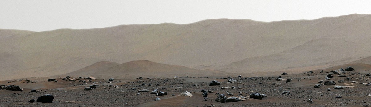 This section of a composite image made available by NASA, produced from photos captured Feb. 21, 2021 by the Perseverance Mars rover shows the rim of Jezero Crater on the surface of Mars. It landed on ...
