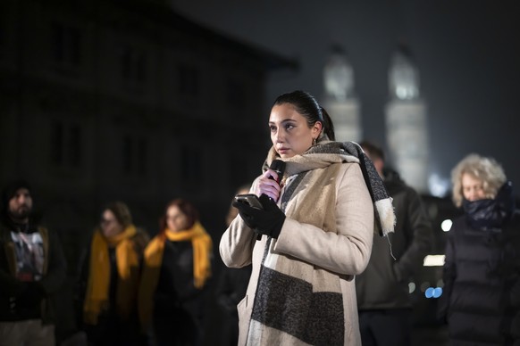 Yuval Raphael, center, a survivor of the attack on the Nova music festival speaks next to Shmuel Moha, left, a survivor from Kibbutz Nirim and Corine Mauch, Mayor of the City of Zurich, right, during  ...