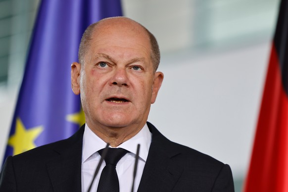 epa10907353 German Chancellor Olaf Scholz delivers a statement to the situation in Israel at the Chancellery in Berlin, Germany, 08 October 2023. After a surprise attack on Israel claimed by the Islam ...