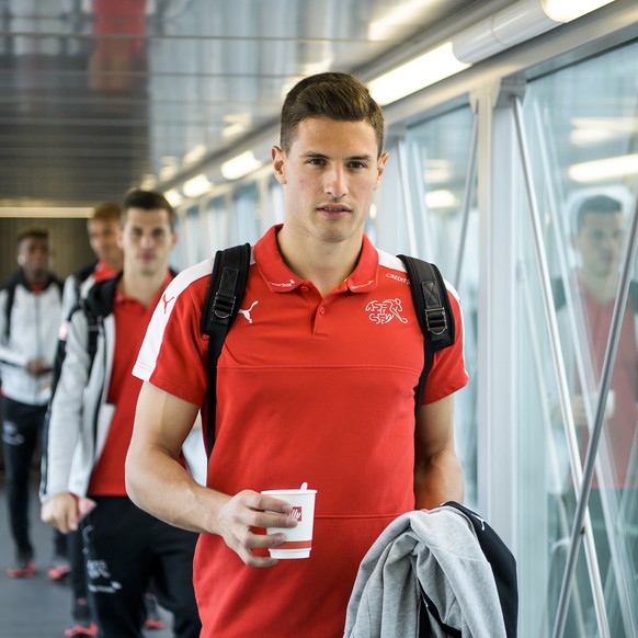 Switzerland&#039;s soccer player Fabian Schaer, reacts before taking the aircraft at the EuroAirport Basel Mulhouse, in Basel, Switzerland, Sunday, October 8, 2017. Switzerland soccer team will face P ...