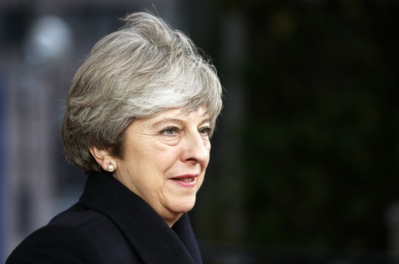 epa06389509 British Prime Minister Theresa May arrives at the European Council meeting in Brussels, Belgium, 14 December 2017. EU leaders gather to discuss the most compelling matters in terms of migr ...