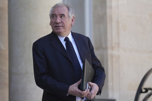 FILE - France&#039;s Prime Minister Francois Bayrou leaves the weekly cabinet meeting, Wednesday, March 19, 2025 at the Elysee Palace in Paris. (AP Photo/Thibault Camus, File)
France School Abuse