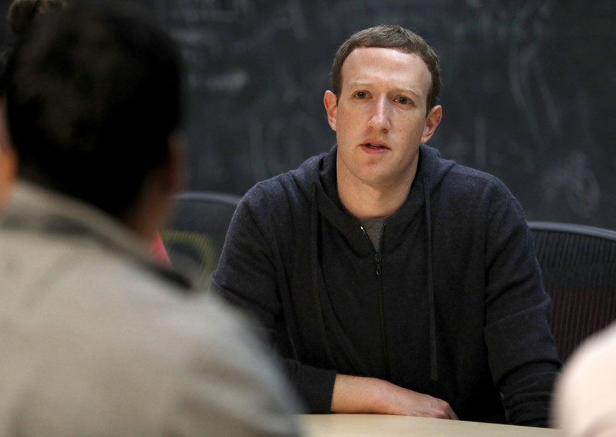 FILE- In this Nov. 9, 2017, file photo, Facebook CEO Mark Zuckerberg meets with a group of entrepreneurs and innovators during a round-table discussion at Cortex Innovation Community technology hub in ...