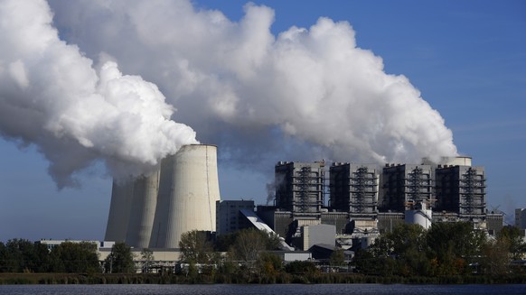 FILE - The Jaenschwalde coal-fired power plant operates in Jaenschwalde, Germany, Oct. 16, 2024. (AP Photo/Matthias Schrader, File)