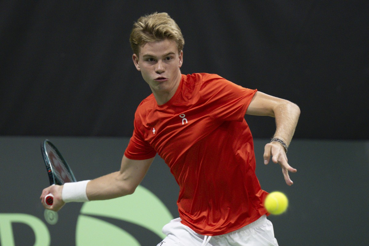 Switzerland's Henry Bernet in action against India's Sumit Nagal during the third single match of the Davis Cup World Group I round between Switzerland and India at the Swiss Tennis Arena in ...