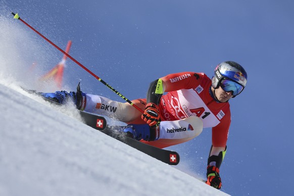 Switzerland's Marco Odermatt speeds down the course during an alpine ski, men's World Cup giant slalom, in Soelden, Austria, Sunday, Oct. 23, 2022. (AP Photo/Marco Trovati)