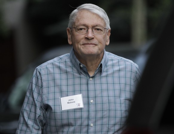 FILE - In this Wednesday, July 11, 2012, file photo, John Malone. chairman of Liberty Media, arrives at the Allen &amp; Company Sun Valley Conference in Sun Valley, Idaho. Motor sport’s governing body ...