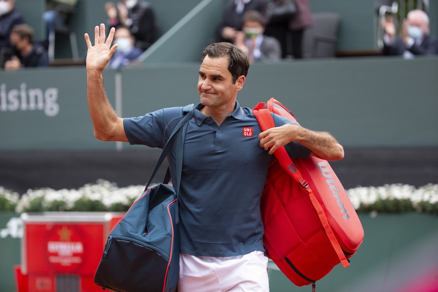 epa09209166 Roger Federer of Switzerland reacts after losing his second round match against Pablo Andujar of Spain at the ATP 250 Geneva Open tennis tournament in Geneva, Switzerland, 18 May 2021. EPA ...