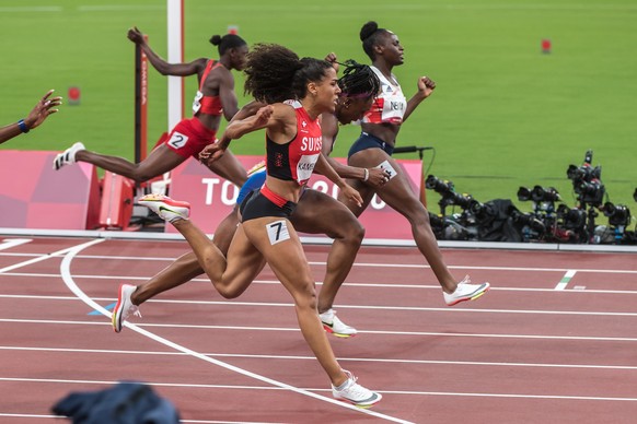 Mujinga Kambundji of Switzerland , number 7, finishes the semi final in the women�s 100 m in second position and qualifies for the final at the 2020 Tokyo Summer Olympics Games in Tokyo, Japan, on Sat ...