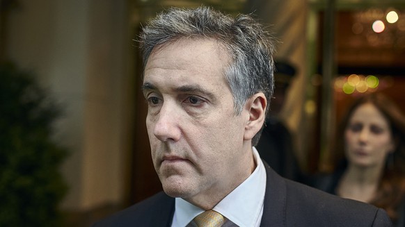 Michael Cohen departs his apartment building on his way to Manhattan criminal court, Thursday, May 16, 2024, in New York. The prosecutors? star witness in the hush money case against former President  ...