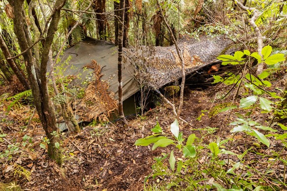 FILE - This photo released by the New Zealand Police on Sept 10, 2025, shows the main campsite where Tom Phillips and his children were hiding in the bush near Waitomo, in the district of Waikato, New ...