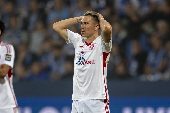 epa11364509 Felix Klaus of Dusseldorf (R) reacts during the German Bundesliga Relegation play-offs, 1st soccer match between VfL Bochum and Fortuna Duesseldorf in Bochum, Germany, 23 May 2024. EPA/CHR ...