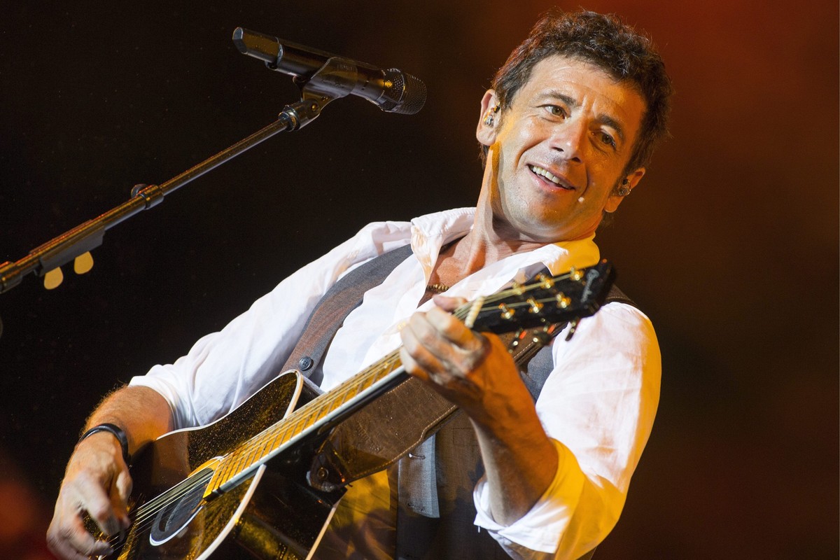 French singer Patrick Bruel performs on the main stage, during the 38th edition of the Paleo Festival in Nyon, Switzerland, Sunday, July 28, 2013. The Paleo open-air music festival, the largest in the ...
