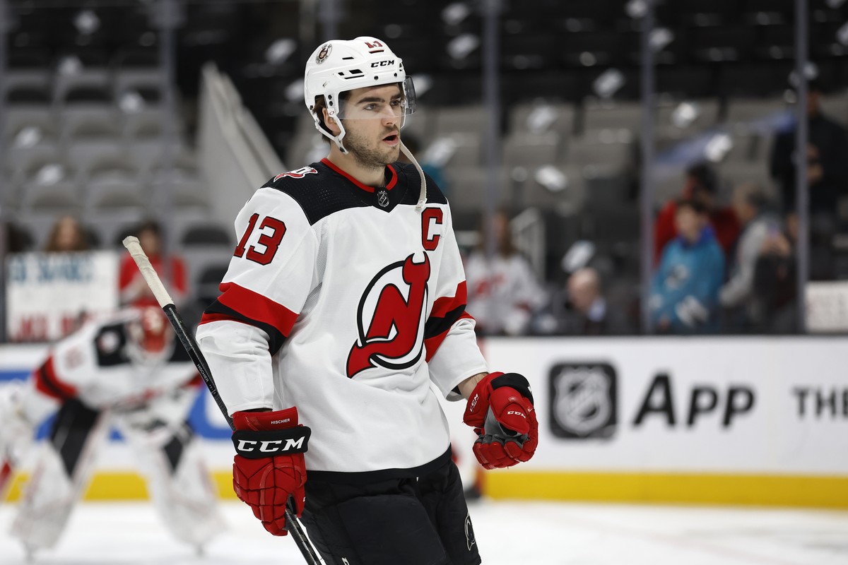 New Jersey Devils center Nico Hischier (13) skates during warmups before an NHL hockey game against the San Jose Sharks on Monday, Jan. 16, 2023, in San Jose, Calif. (AP Photo/Josie Lepe)