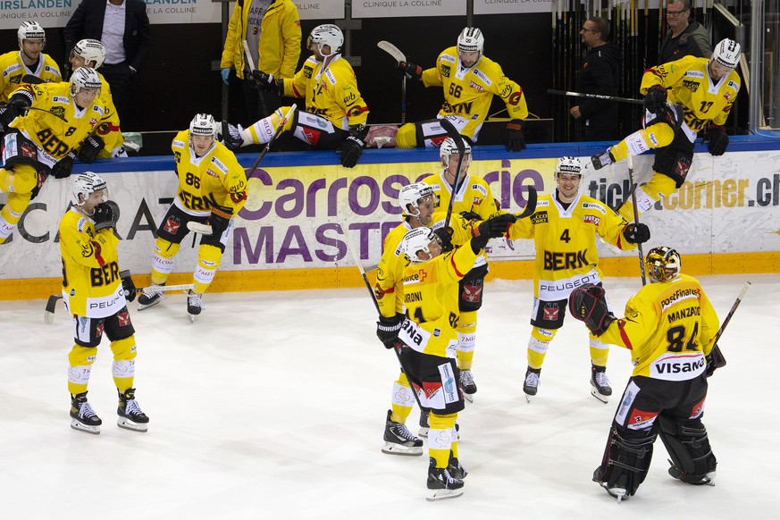 Bern&#039;s players celebrate their victory after beating Geneve-Servette team during the shootout session, at the pre-season game of the National League between Geneve-Servette HC and SC Bern, at the ...