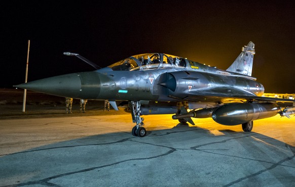 This photo released on Monday, Nov. 9, 2015 by the French Army Communications Audiovisual office (ECPAD) shows a French army Mirage 2000 jet on the tarmac of an undisclosed air base as part of France& ...
