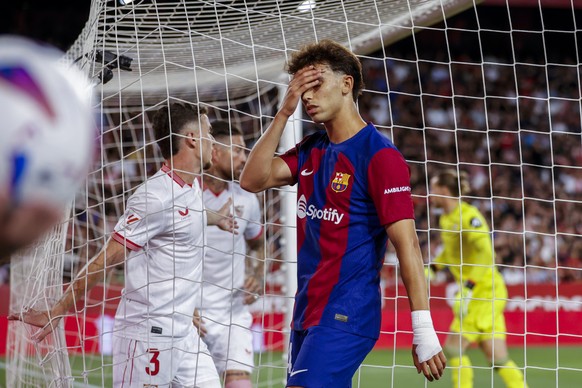 Barcelona&#039;s Joao Felix reacts during a Spanish La Liga soccer match between Sevilla and FC Barcelona at the Ramon Sanchez Pizjuan stadium in Seville, Spain, Sunday, May 26, 2024. (AP Photo/Fermin ...