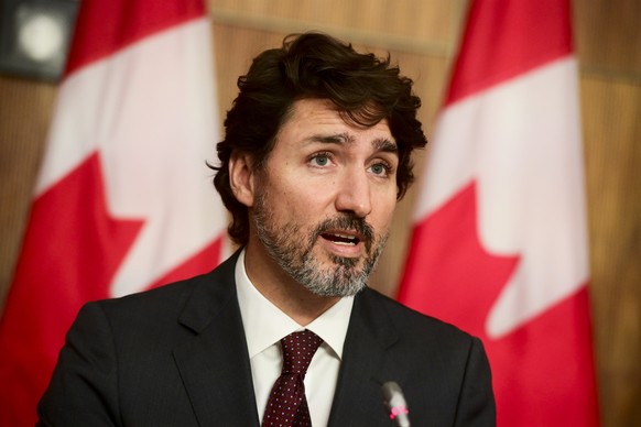 Canadian Prime Minister Justin Trudeau takes part in a press conference during the COVID-19 pandemic in Ottawa, Ontario, on Tuesday, Oct. 13, 2020. (Sean Kilpatrick/The Canadian Press via AP)
Justin T ...