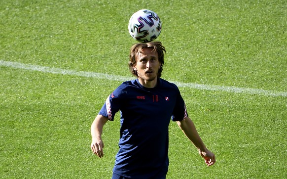 Croatia's Luka Modric controls the ball during a training session at the Hampden Park Stadium in Glasgow, Thursday, June 17, 2021, the day before their group D Euro 2020 match against Czech Republic. (Andy Buchanan/Pool via AP)
