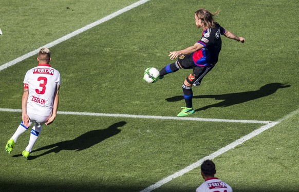 Basel&#039;s defender Michael Lang, right, scores a goal next to Sion&#039;s defender Reto Ziegler during the Swiss Cup final soccer match between FC Basel 1893 and FC Sion at the stade de Geneve stad ...