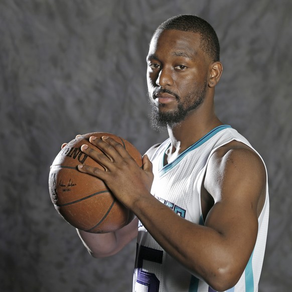 In this photo taken Sept. 26, 2016, Charlotte Hornets' Kemba Walker poses for a photo during the NBA basketball team's media day in Charlotte, N.C. Walker has been on the verge of becoming a ...