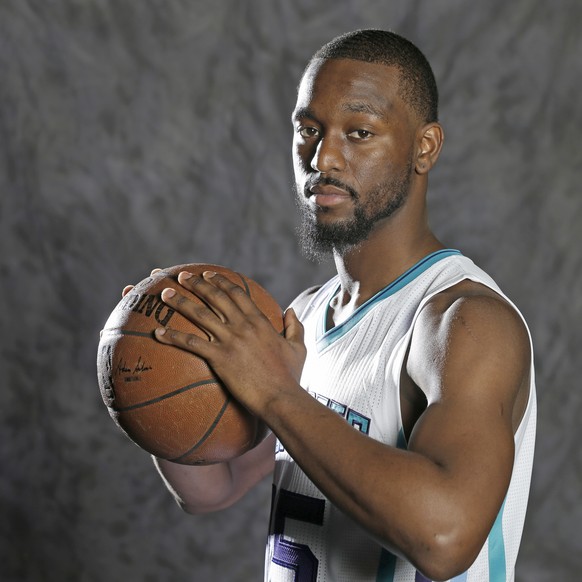 In this photo taken Sept. 26, 2016, Charlotte Hornets&#039; Kemba Walker poses for a photo during the NBA basketball team&#039;s media day in Charlotte, N.C. Walker has been on the verge of becoming a ...