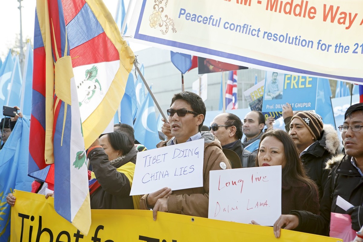 Uyghurs and Tibetan people demonstrate against China during the Universal Periodic Review of China by the Human Rights Council, on the place des Nations in front of the European headquarters of the Un ...